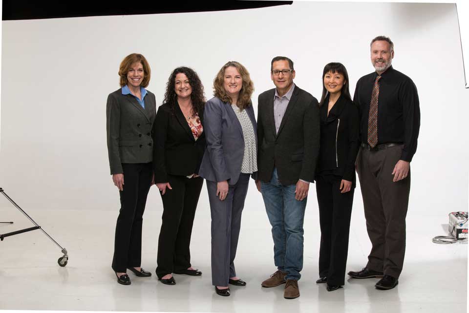 a group of humans in a photography studio